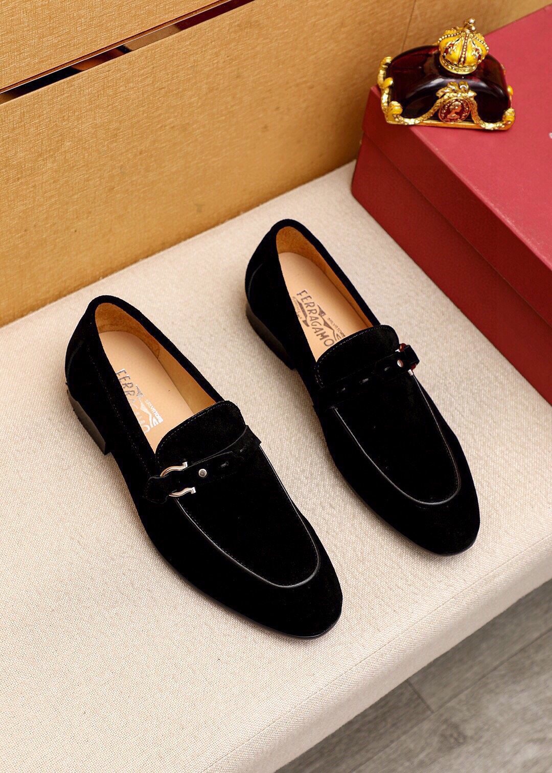 Ferragamo Black Hardware Loafers — hero