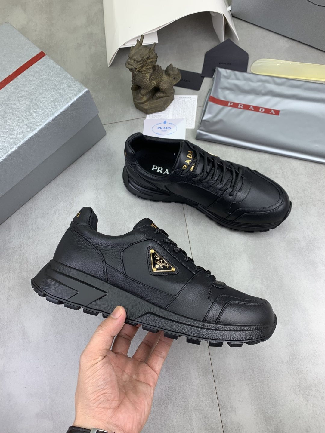 Prada Black Lug Sole Sneakers — side