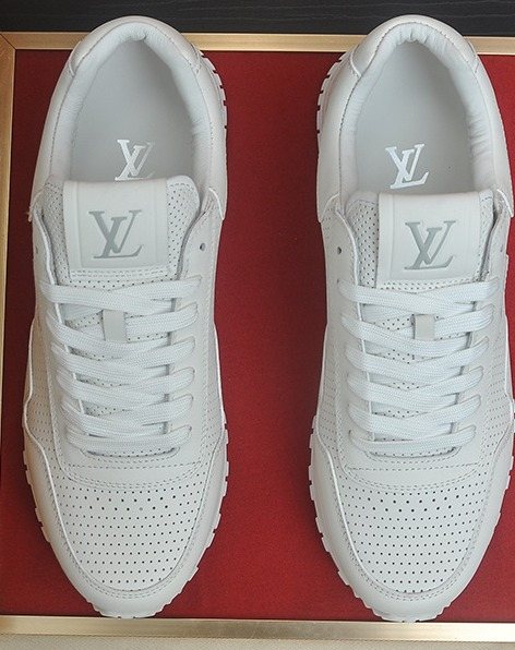 Louis Vuitton White Perforated Low-Top Sneakers — front