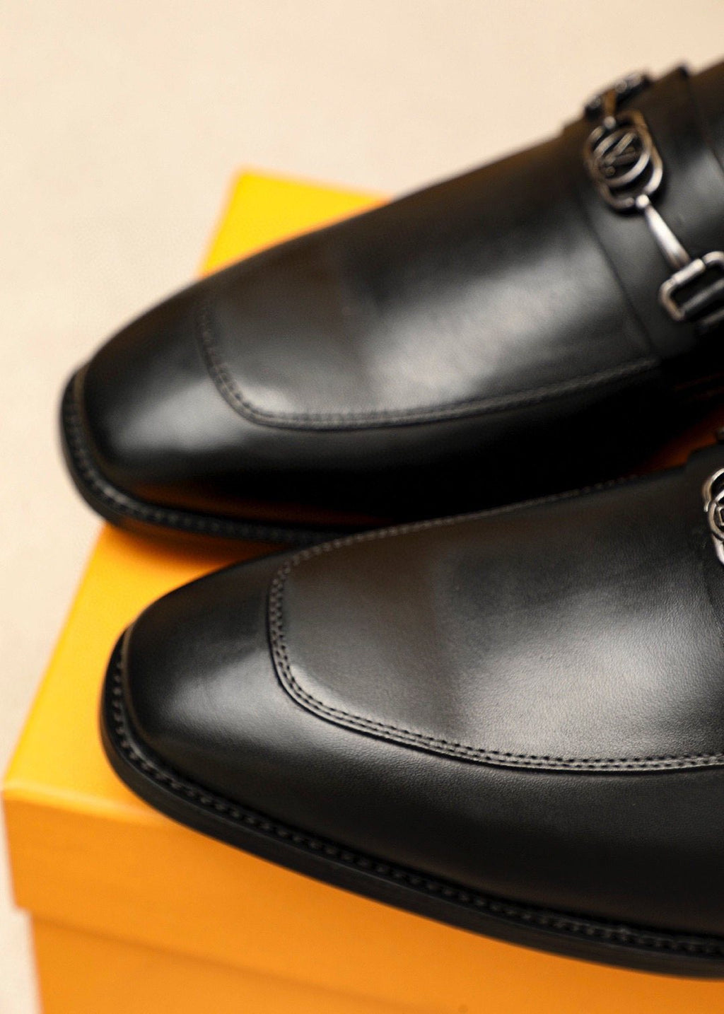 Louis Vuitton Metal-Bit Leather Loafers — detail
