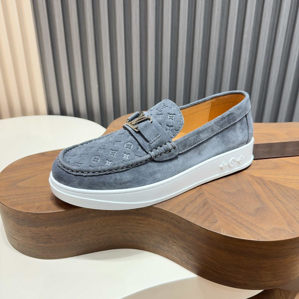 Louis Vuitton Embossed Slip-On Sneakers — front