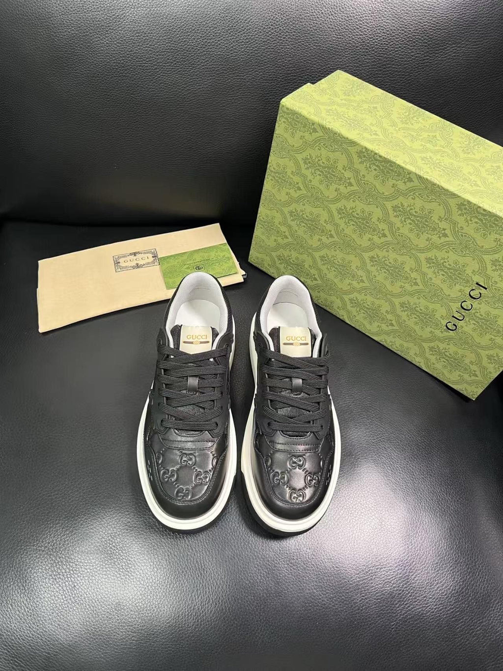 Gucci Embossed Low-Top Sneakers — front