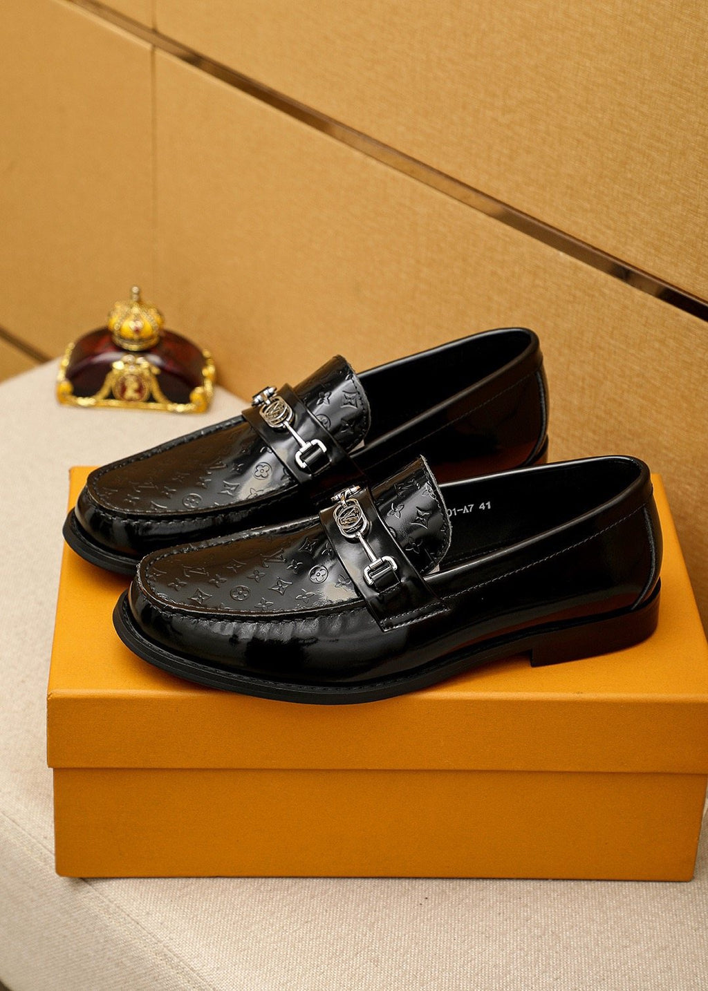 Louis Vuitton Embossed Buckle Loafers — front